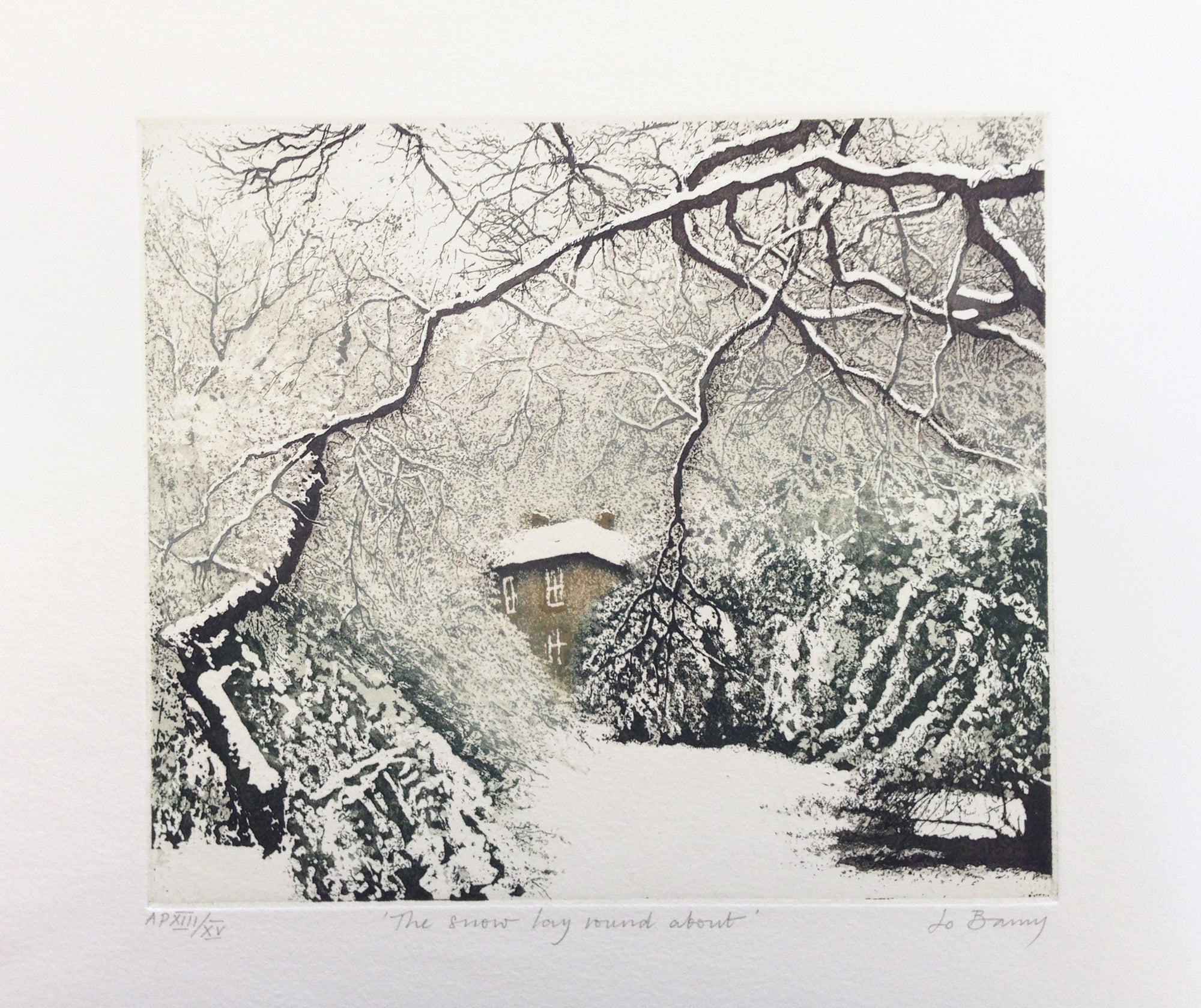 Hand colored etching of snowy winter scape with a cabin peaking through the trees.