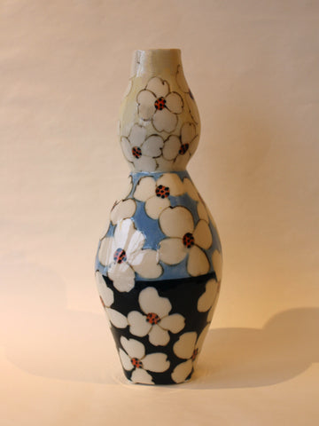 Vase in Shades of Blue With White Flowers