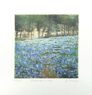 Hand colored etching of blue flower field landscape.